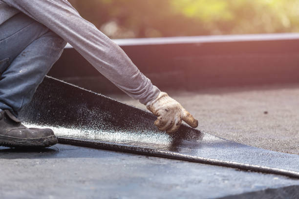 Professional Emergency Waterproofing technician working in Raymond, OH